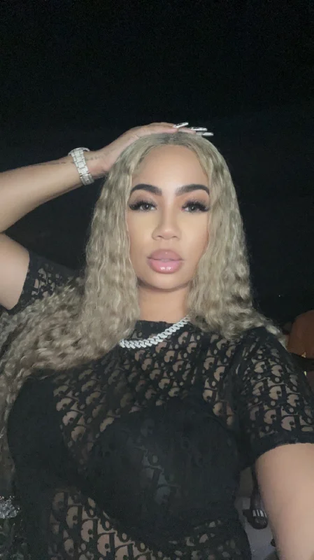 Colored wig with a curly texture for a bold and stylish choiceSheema