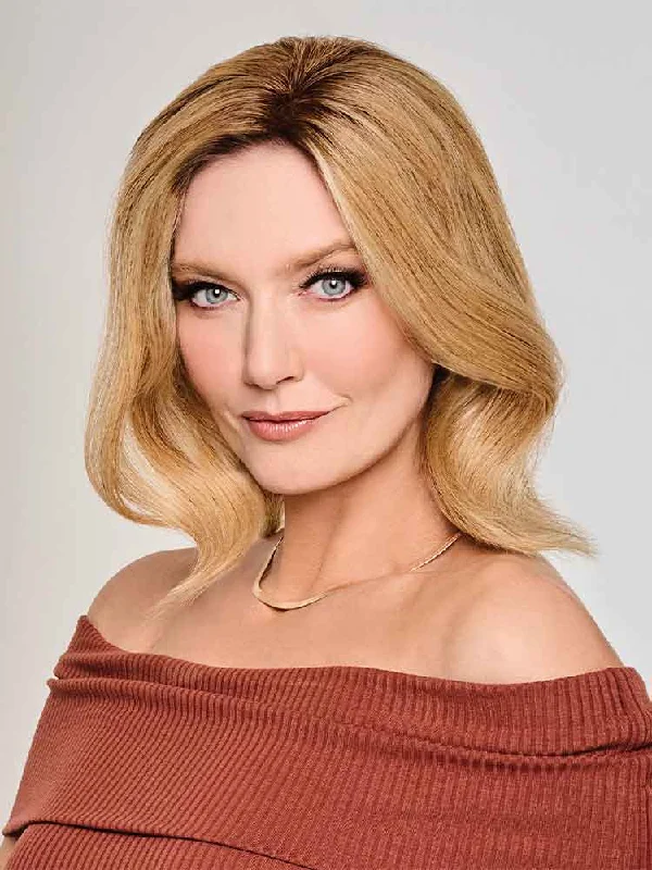 Bob wig made from high - quality synthetic fibersGuilty Pleasure 10” Human Hair Top Piece - Raquel Welch
