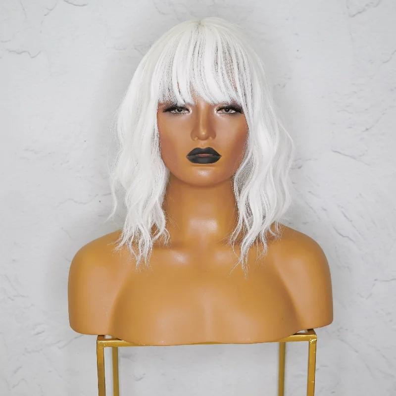 Bob wig with a curly fringe for a playful and youthful vibeHAYLEY White Bob Fringe Wig Bob wig with a curly fringe for a playful and youthful vibeHAYLEY White Bob Fringe Wig