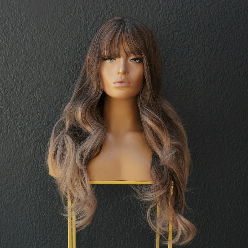 Wavy wig with a side - part for a more flattering lookADELE Ombre Brown Fringe Wig