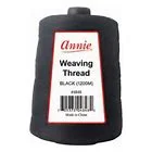 Clip - in hair extensions in a jet - black color for a classic and timeless appearanceAnnie Weaving Thread - Black Clip - in hair extensions in a jet - black color for a classic and timeless appearanceAnnie Weaving Thread - Black