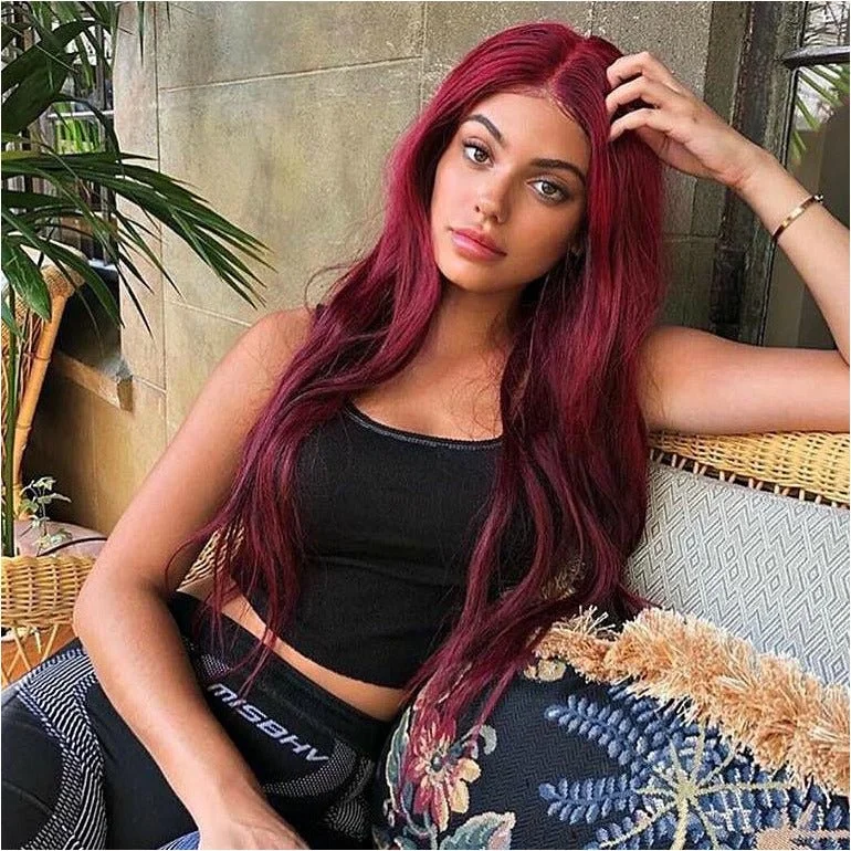 Wavy wig with a wispy fringe for a soft and feminine lookCherry Bomb Burgundy Lace Front Wig