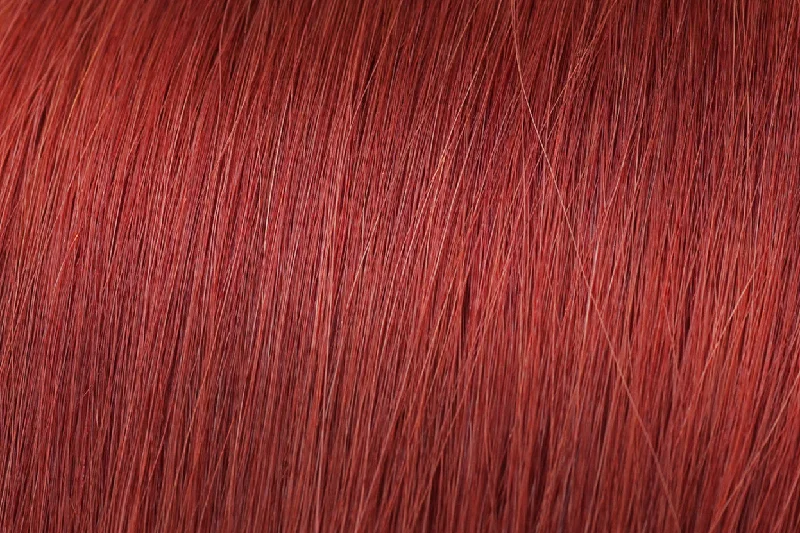 Clip - in hair extensions with a wispy fringe for a soft and feminine lookClip In Extensions: Deep Auburn #135 Clip - in hair extensions with a wispy fringe for a soft and feminine lookClip In Extensions: Deep Auburn #135