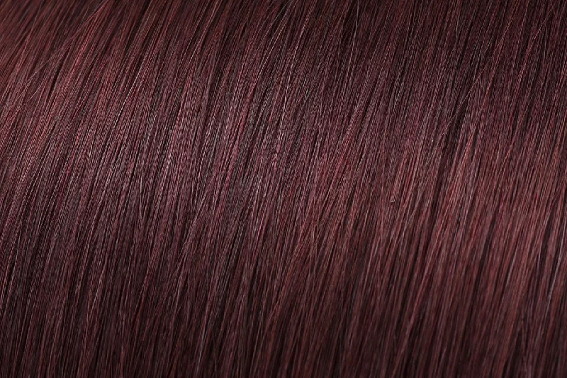 Clip - in hair extensions with a pre - bleClip In Extensions: Plum #99J