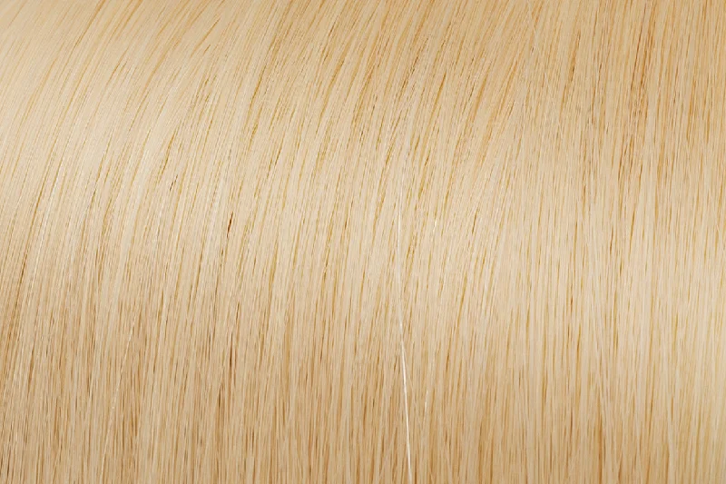 Clip - in hair extensions with a middle - part for a classic and elegant styleClip In Extensions: Warm Lightest Blonde #613 Clip - in hair extensions with a middle - part for a classic and elegant styleClip In Extensions: Warm Lightest Blonde #613