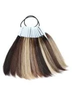 Wig with feathered bangs for a soft lookRaquel Welch Couture Color Ring