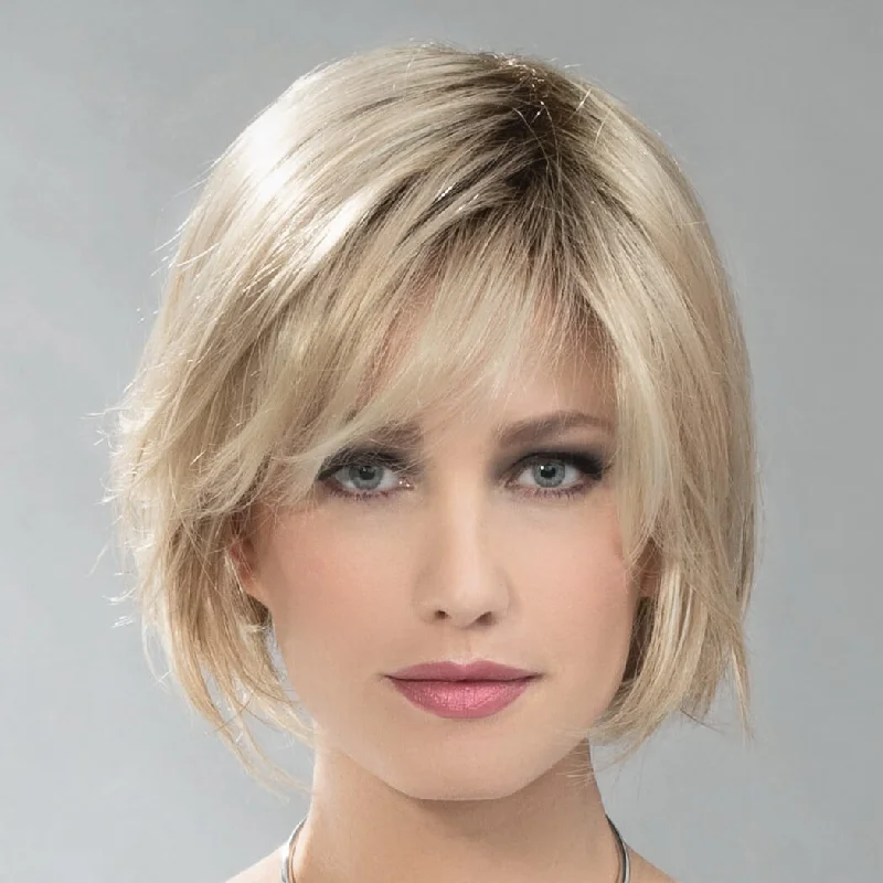 Wig with bangs for a 1980s retro lookRule by Ellen Wille (Basic Cap-Mono Crown Wig) Wig with bangs for a 1980s retro lookRule by Ellen Wille (Basic Cap-Mono Crown Wig)