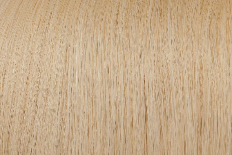 Clip - in hair extensions with a wispy fringe for a soft and feminine lookSeamless Clip-In Extension: Ash Lightest Blonde #60 Clip - in hair extensions with a wispy fringe for a soft and feminine lookSeamless Clip-In Extension: Ash Lightest Blonde #60