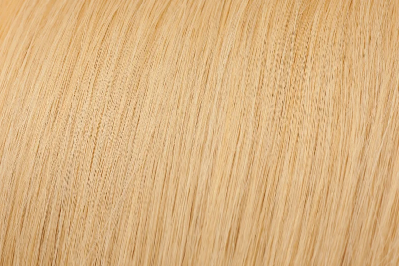 Clip - in hair extensions with a side - part for a more flattering lookSeamless Clip-In Extension: Dark Golden Blonde #26 Clip - in hair extensions with a side - part for a more flattering lookSeamless Clip-In Extension: Dark Golden Blonde #26