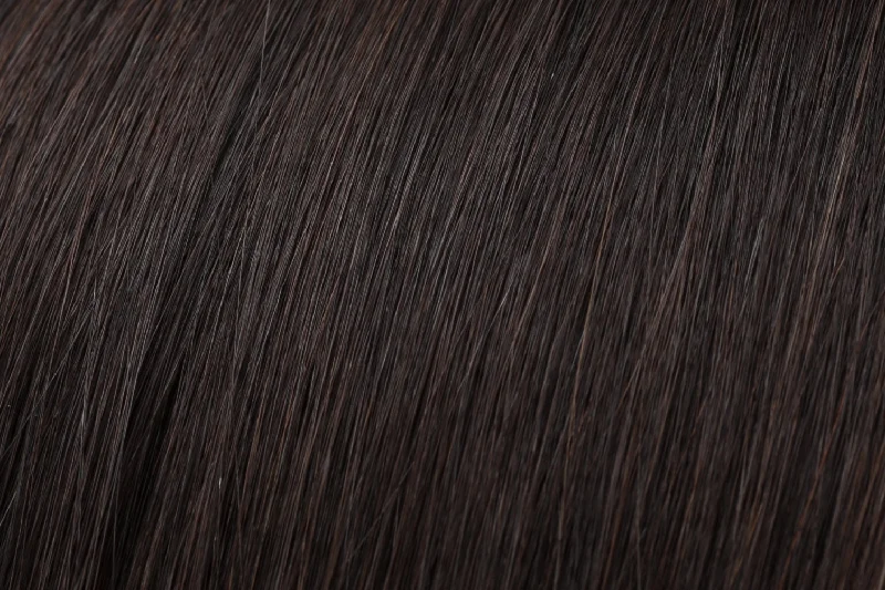 Clip - in hair extensions with a wispy fringe for a soft and feminine lookSeamless Clip-In Extension: Darkest Brown #2 Clip - in hair extensions with a wispy fringe for a soft and feminine lookSeamless Clip-In Extension: Darkest Brown #2