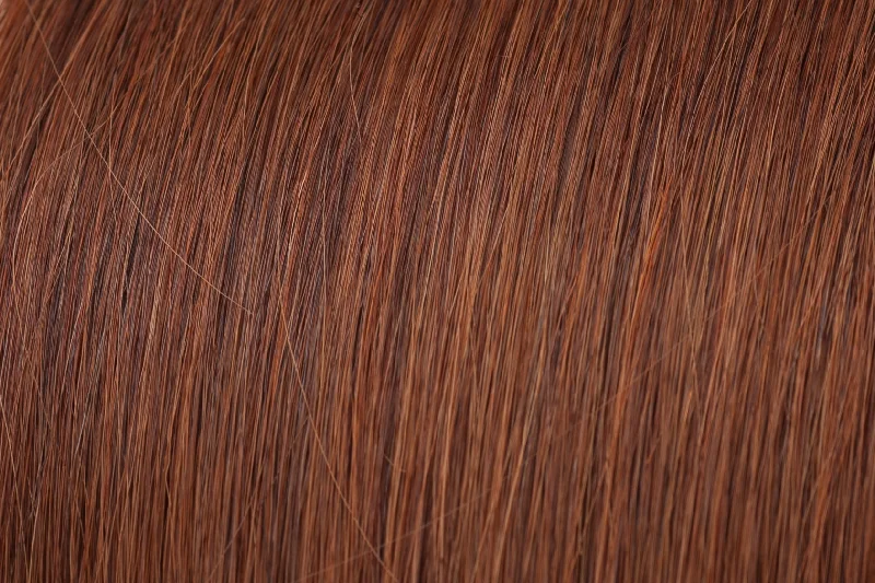 Clip - in hair extensions with a middle - part for a classic and elegant styleSeamless Clip-In Extension: Deep Copper #33 Clip - in hair extensions with a middle - part for a classic and elegant styleSeamless Clip-In Extension: Deep Copper #33