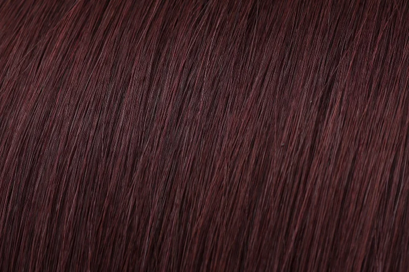 Clip - in hair extensions with a straight texture for a sleek and seamless blendSeamless Clip-In Extension: Plum #99J Clip - in hair extensions with a straight texture for a sleek and seamless blendSeamless Clip-In Extension: Plum #99J