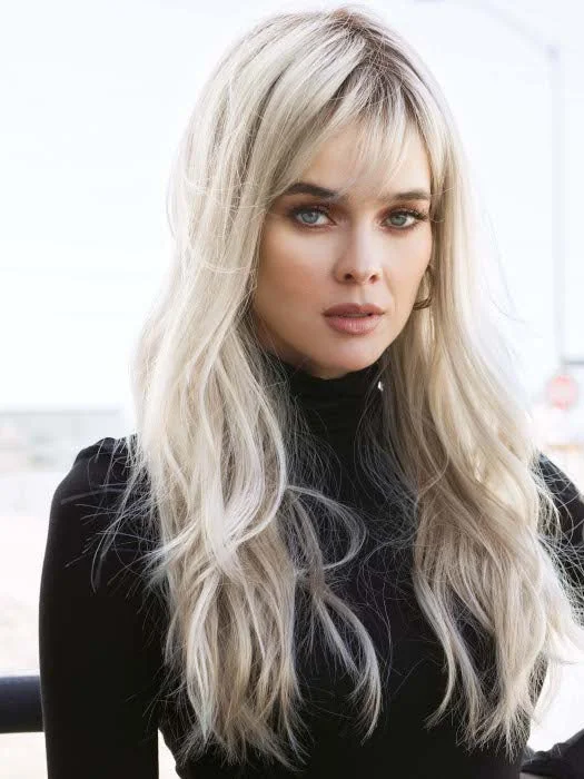 Wavy wig with a wispy fringe for a soft and feminine lookWren Wig by Rene of Paris | Hi Fashion | Synthetic Fiber