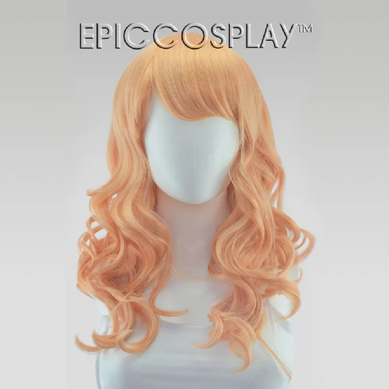 Medium - length wig with a silk - base cap for a comfortable and smooth feelHestia - Peach Blonde Medium - length wig with a silk - base cap for a comfortable and smooth feelHestia - Peach Blonde