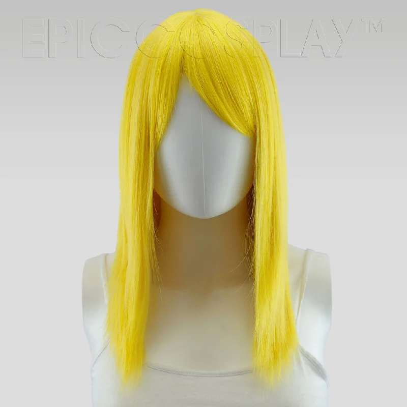 Medium - length wig with a curly fringe for a playful and youthful vibeTheia - Rich Butterscotch Blonde Wig Medium - length wig with a curly fringe for a playful and youthful vibeTheia - Rich Butterscotch Blonde Wig